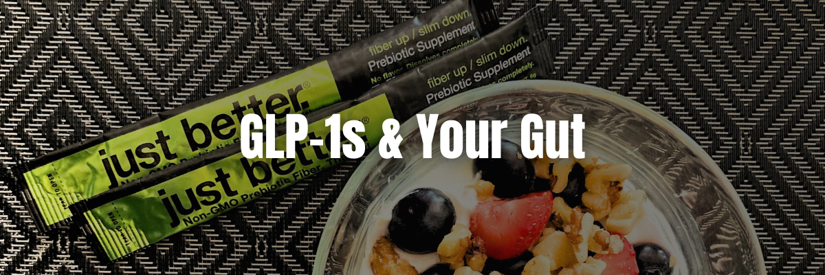 Two stick packs of just better prebiotic fiber with a yogurt bowl on a textured background.