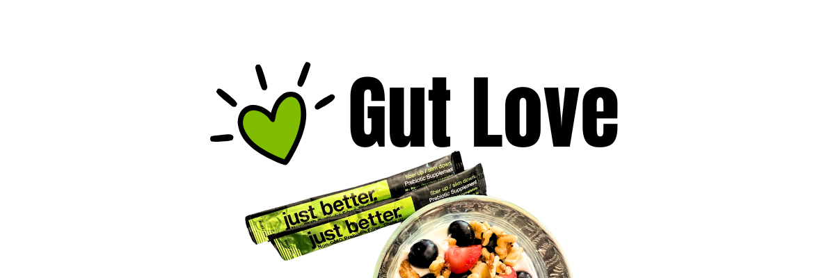 A green heart and a bowl of fruit and yogurt with two stick packs. Text overlay reads: Gut Love