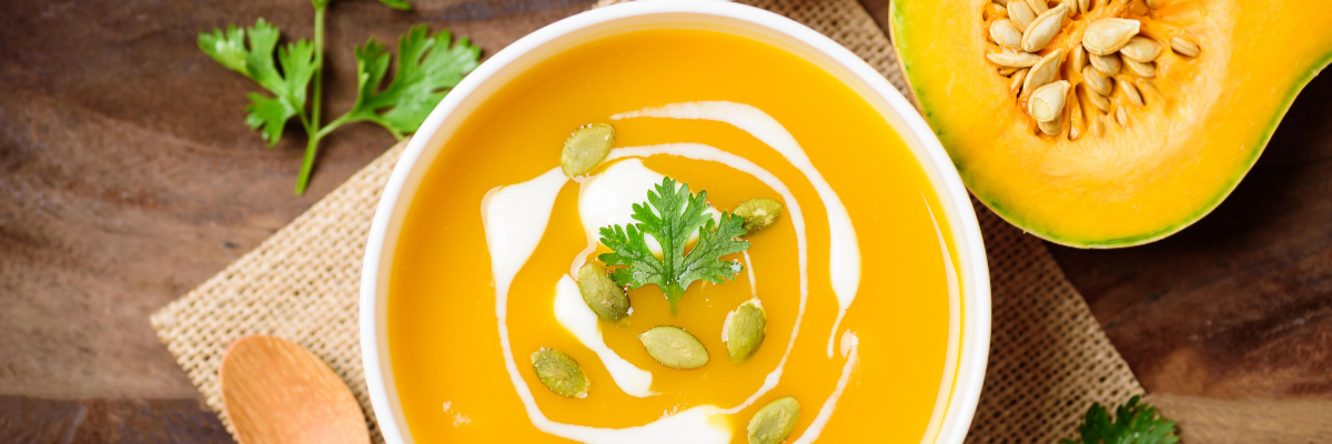 Butternut squash soup with creme fresh and papitas.