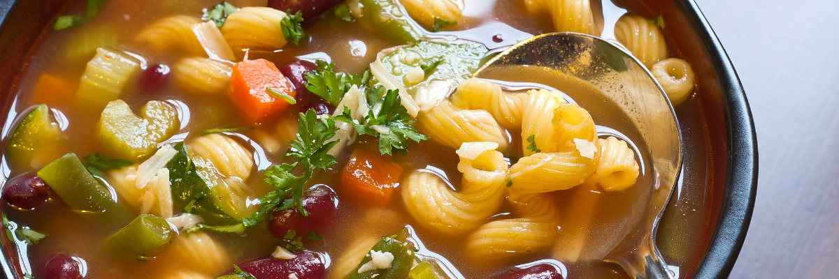 A bowl of Fiber-Rich Minestrone Soup with Whole-Grain Pasta