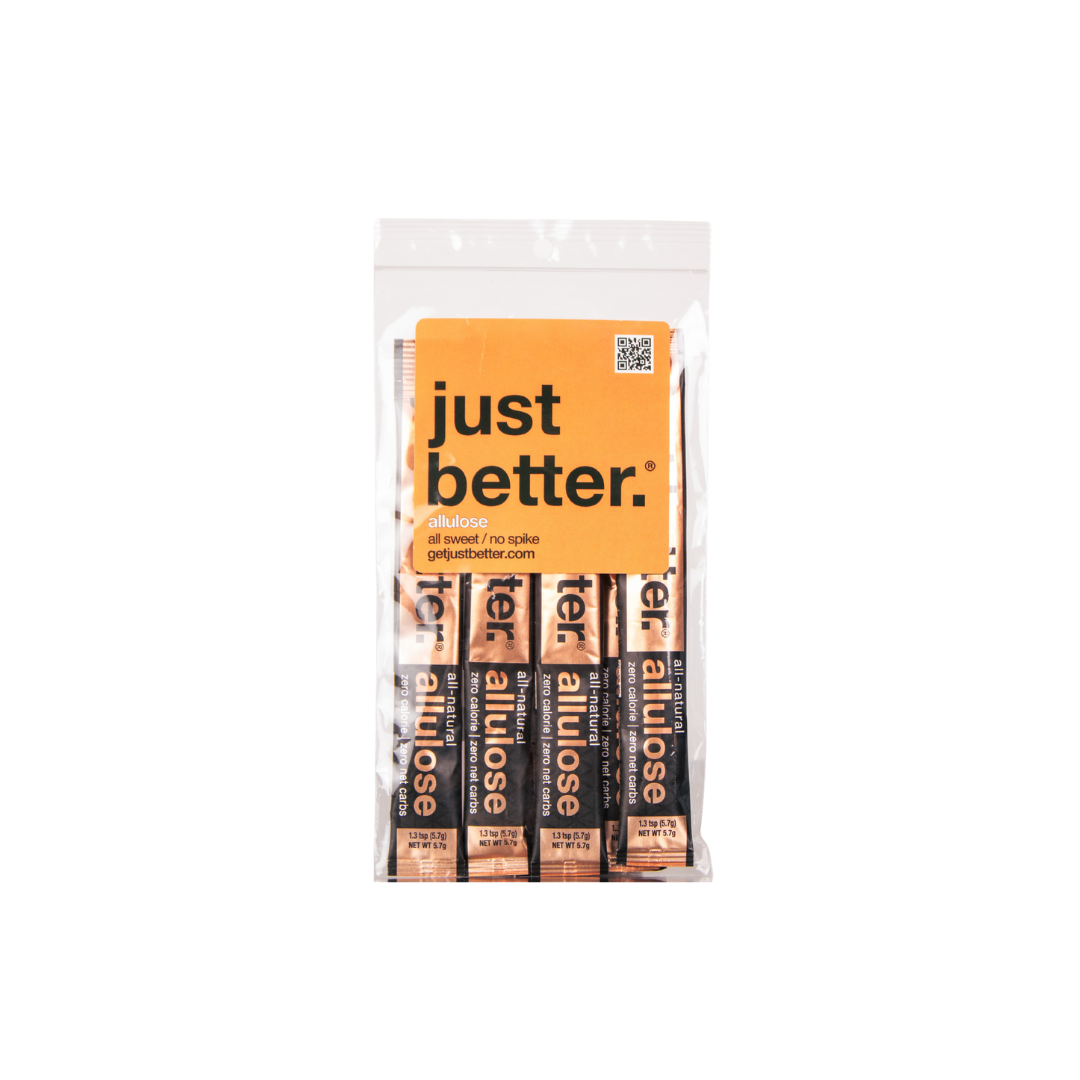 Pack of Just Better allulose products with an orange label on a white background