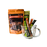 just better allulose stick packs and just better prebiotic fiber stick packs in a clear mug, with the pouches of just better allulose stick packs and just better prebiotic fiber stick packs in the background